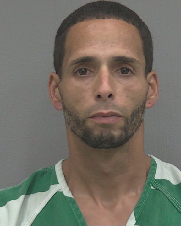 Booking photo of Carlos Gonzalez