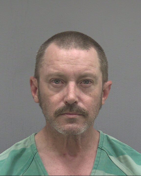 Booking photo of Christopher Adams