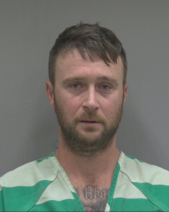 Booking photo of Travis Hasson