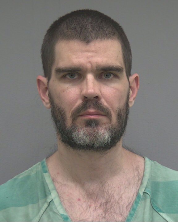 Booking photo of Joshua Snavely