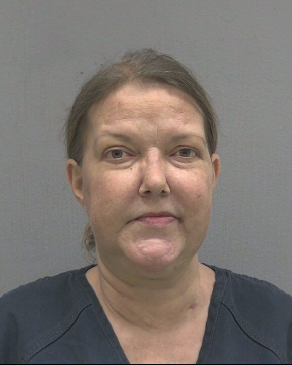 Booking photo of Kelly Brooker