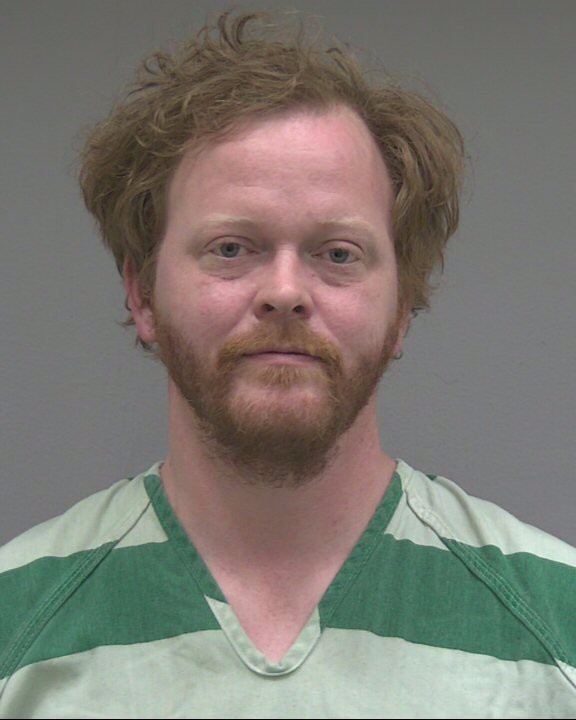Booking photo of Joshua Huey