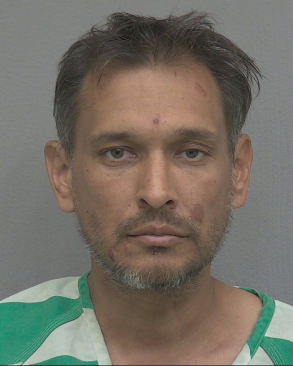 Booking photo of Charles Scott