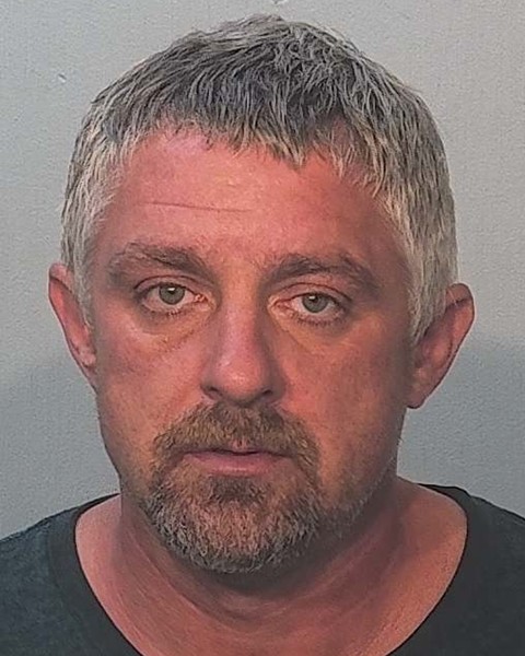 Booking photo of Dustin Beber