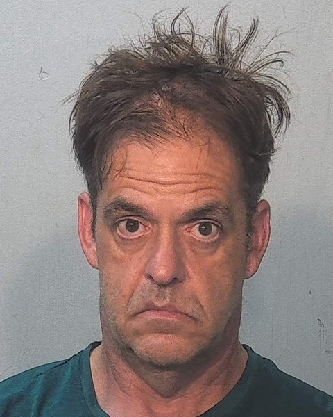 Booking photo of Eric Adams