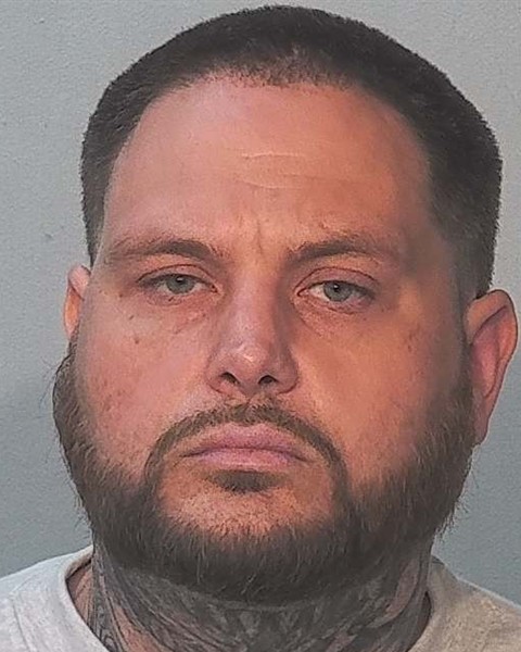 Booking photo of Christopher Caldwell