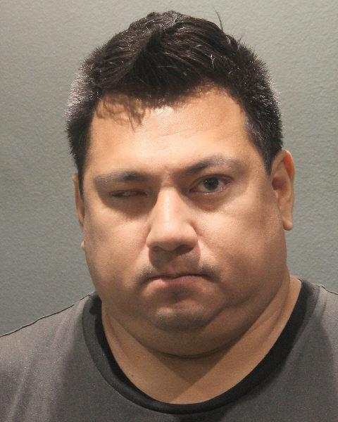 Booking photo of Christopher Cartagena Nguyen