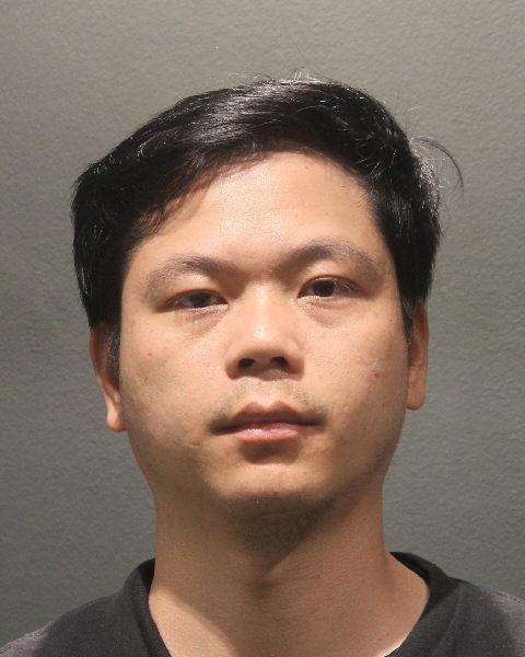 Booking photo of Rong Zheng