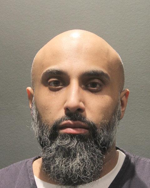 Booking photo of Aman Lail