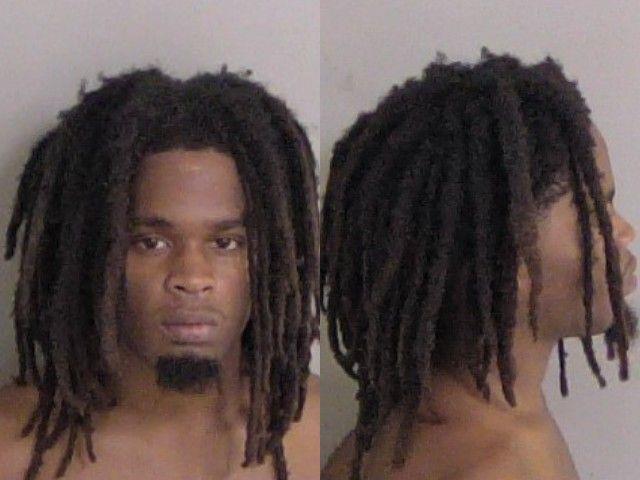Booking photo of Adrian Johnson