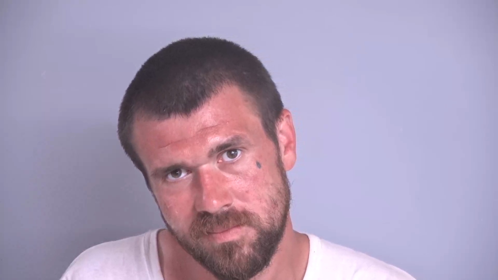 Booking photo of Jonathan Burns