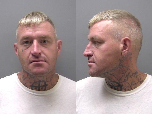 Booking photo of Casey George