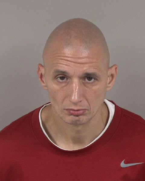 Booking photo of Derek Hartsell