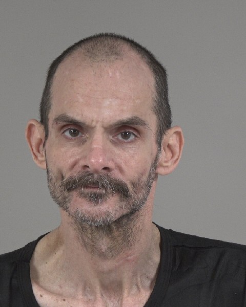 Booking photo of Andrew Leigh