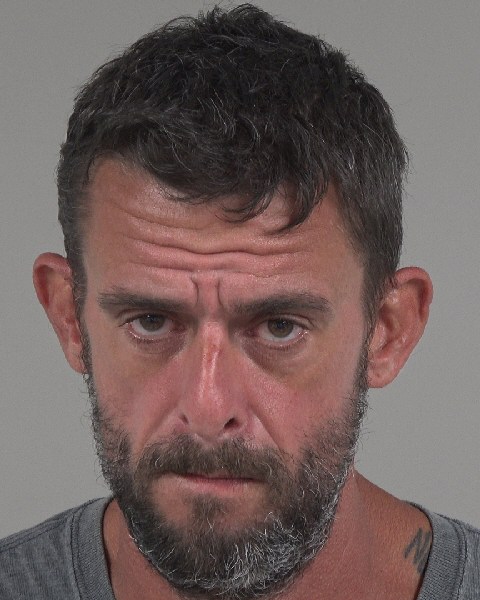 Booking photo of Christopher Lewis