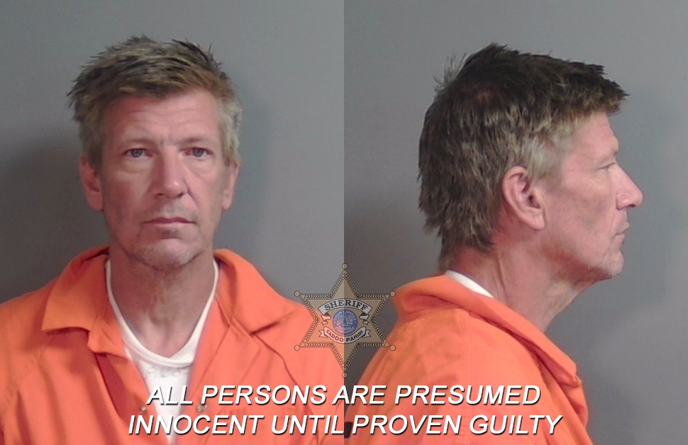 Booking photo of Christopher Robin Flack