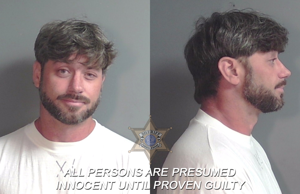 Booking photo of Dustin James Coker