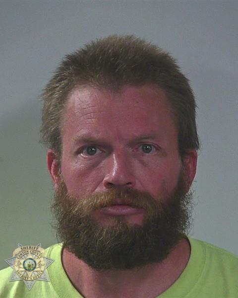 Booking photo of Russell James Baker