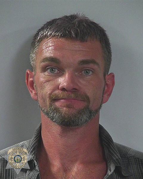 Booking photo of Jonathon German Becker