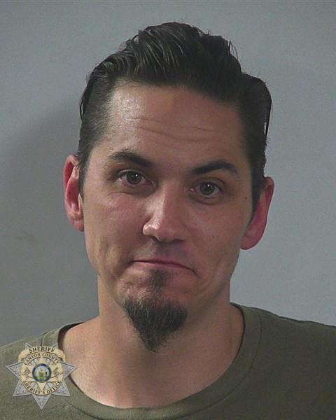 Booking photo of Caleb Joshua Lee