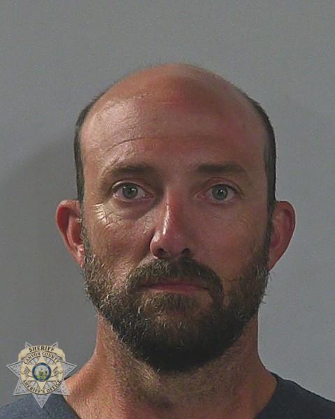 Booking photo of Casey Allan Barker