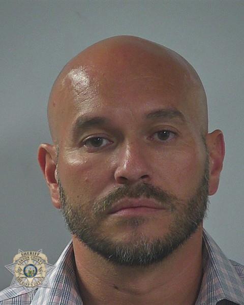 Booking photo of Andrew Scott Gomez