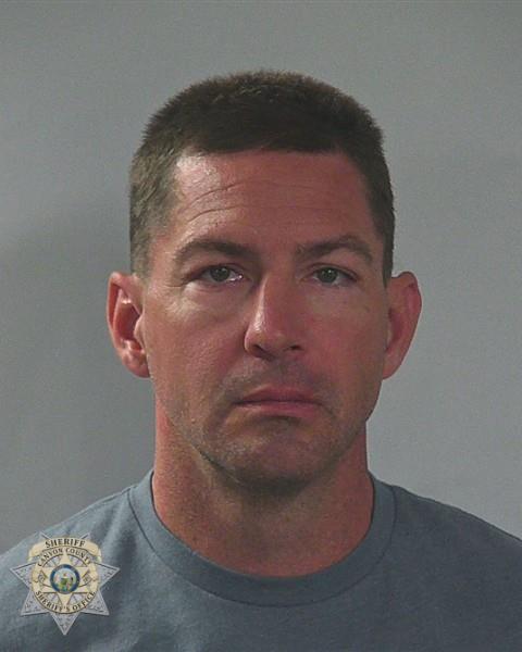 Booking photo of Justin Scott Calkins