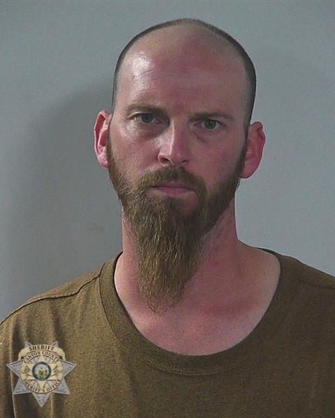 Booking photo of Travis Joseph Clayton