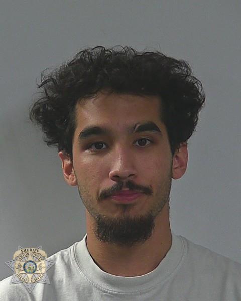 Booking photo of Damien Alexzander Portillo