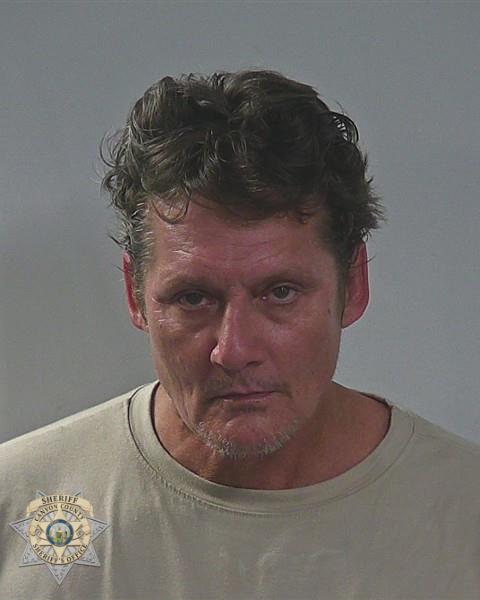 Booking photo of John Edgar Steven Schultz