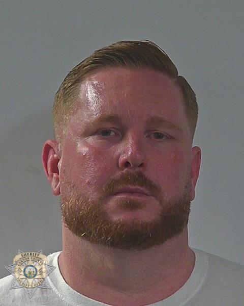 Booking photo of Jon Michael Iacampo