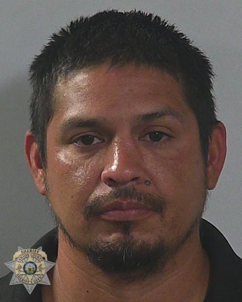 Booking photo of Carlos Jr Guitron