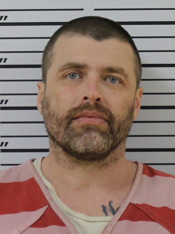 Booking photo of Michael Cox