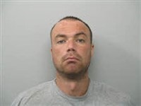 Booking photo of Travis Earl Pugh