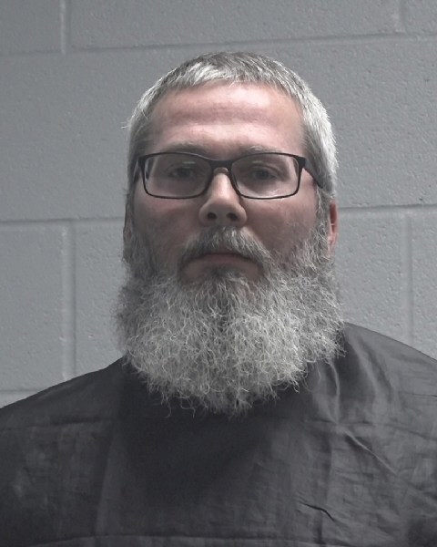 Booking photo of Johnny Moore