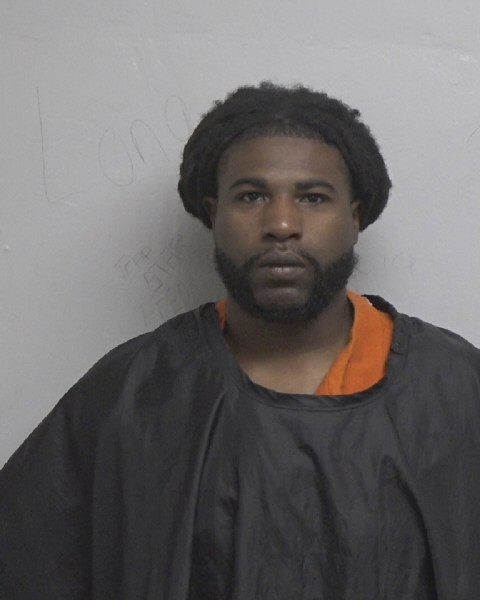 Booking photo of Romello Reed