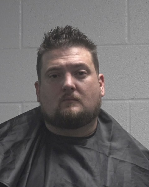 Booking photo of Patrick Holland