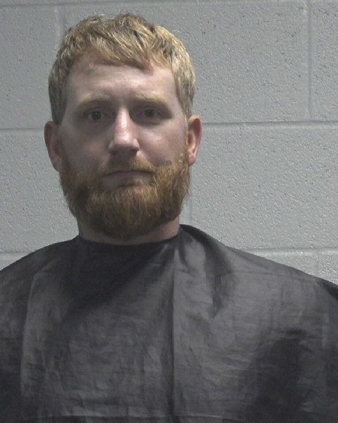 Booking photo of Justin Reynolds