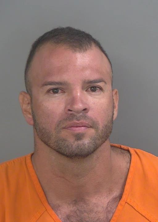 Booking photo of Carlos Martinez