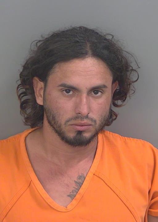 Booking photo of Emmer Garcia-taleno