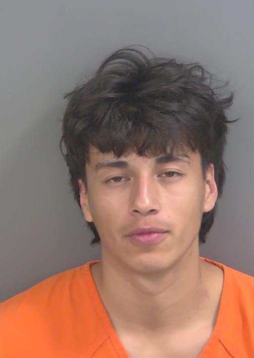 Booking photo of Christian Guevarazuniga