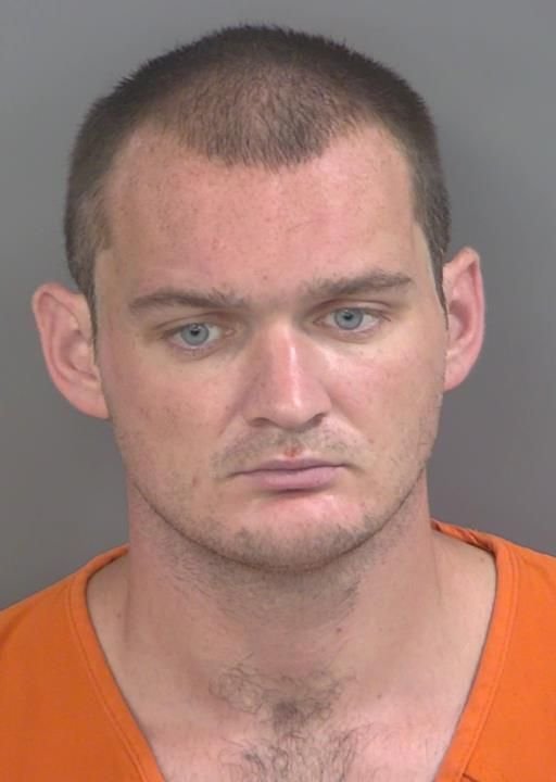 Booking photo of Trent Mansberger