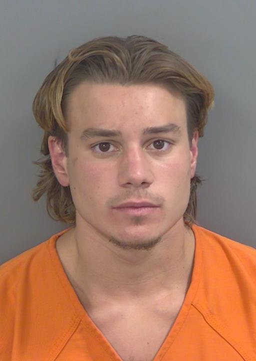 Booking photo of Tomas Topalli