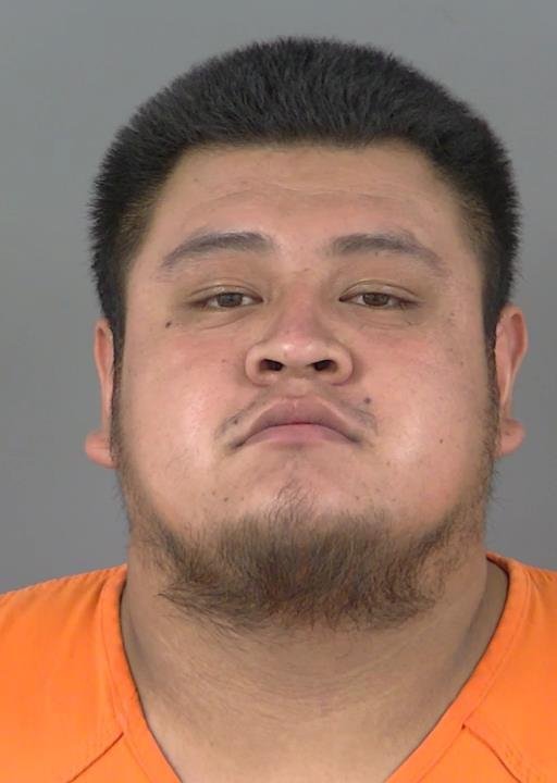 Booking photo of Carlos Binuelo-botho