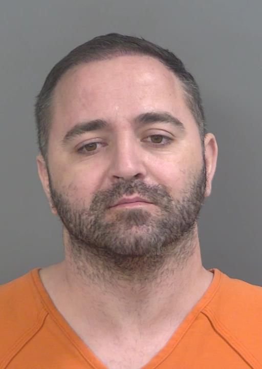 Booking photo of Asllan Kaci