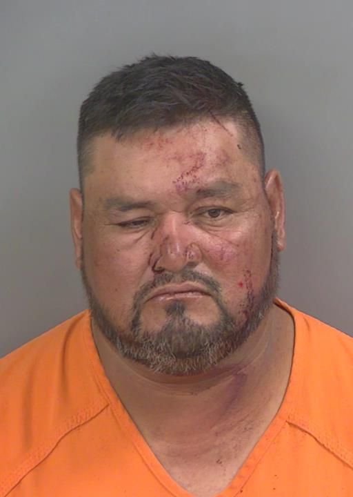 Booking photo of Hector Cancholapena