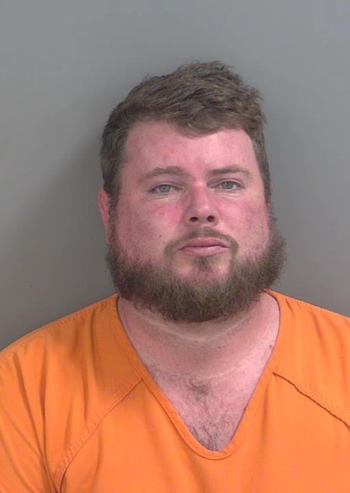Booking photo of Dustin Slusser