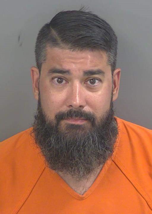 Booking photo of Jonathan Guadron