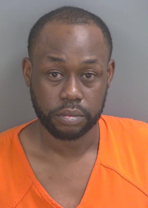 Booking photo of Denis Aime