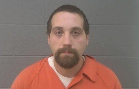 Booking photo of Adam Hawn